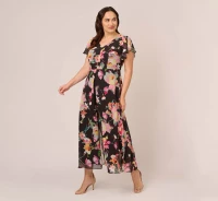 PLUS SIZE FLORAL PRINT CROPPED JUMPSUIT WITH SKIRT OVERLAY IN BLACK MULTI product